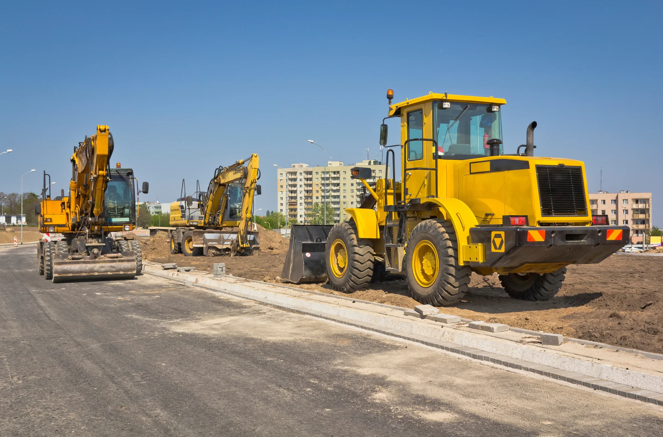 Yellow grader and heavy plant on roadworks